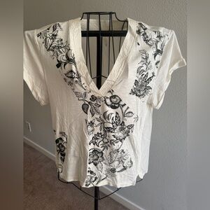 White Graphic Tee with Black Floral Design